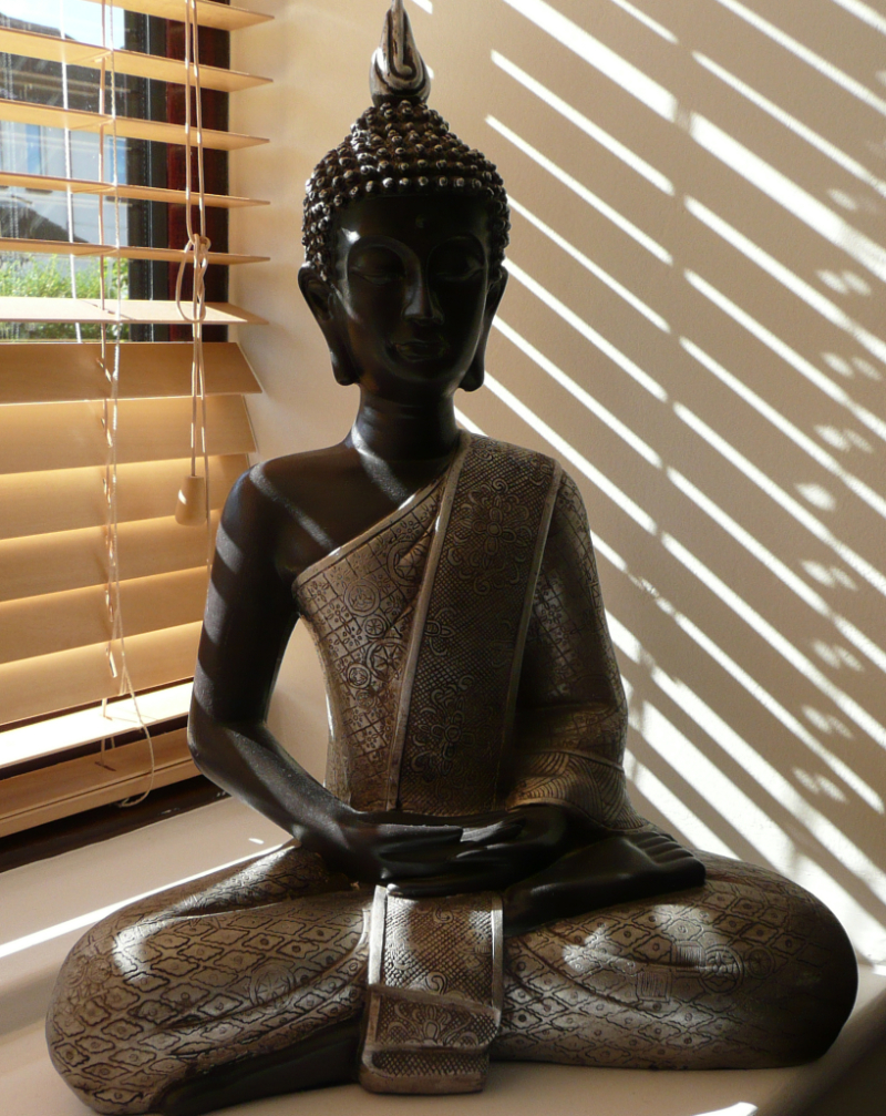 Buddha Statue on window sill