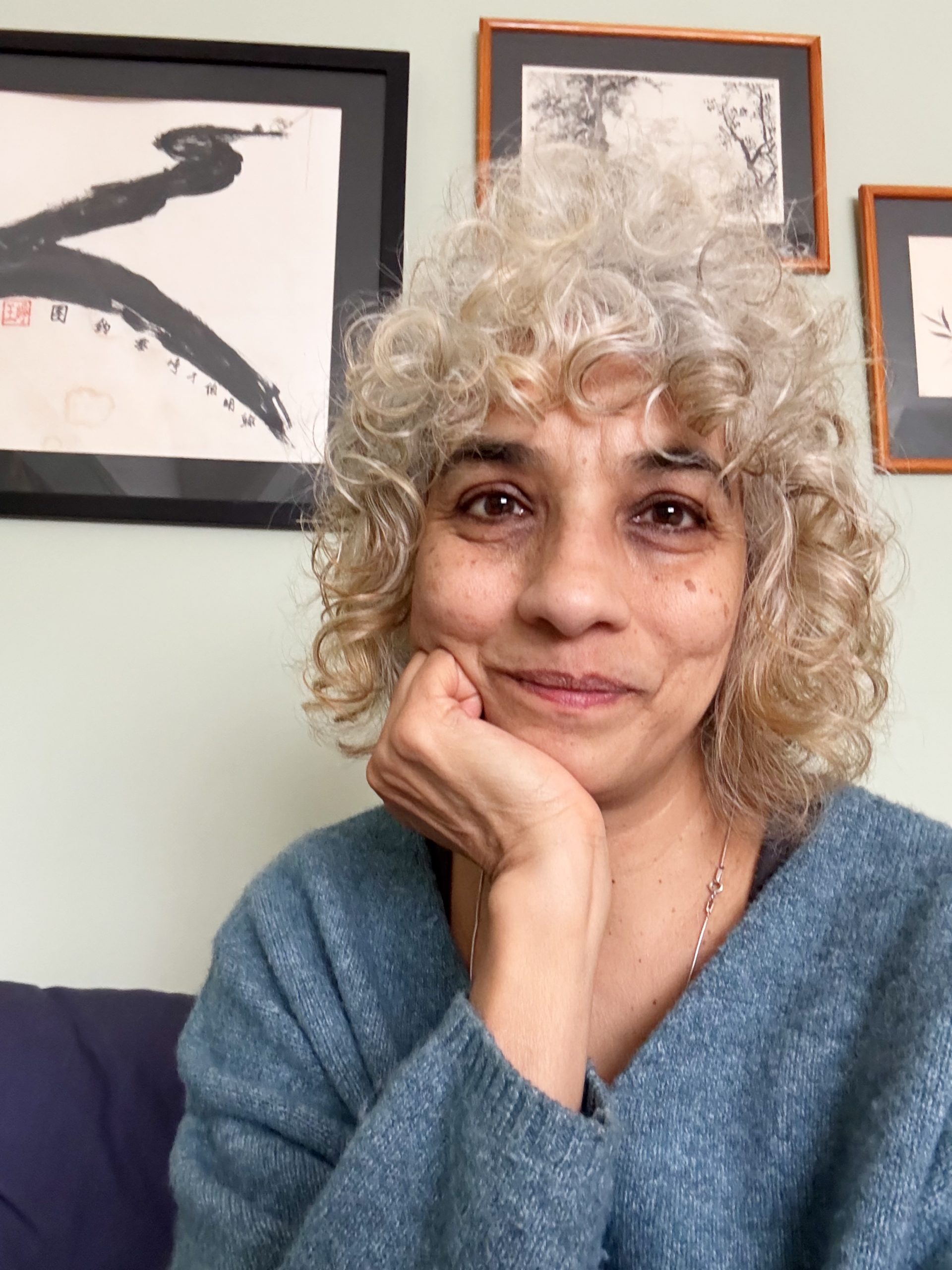 A close-up of a woman with flawless makeup, perfectly shaped brows, and long, voluminous lashes. Her soft expression and radiant skin highlight the results of professional lash and brow treatments available at Honeys Hair & Beauty in Taunton.